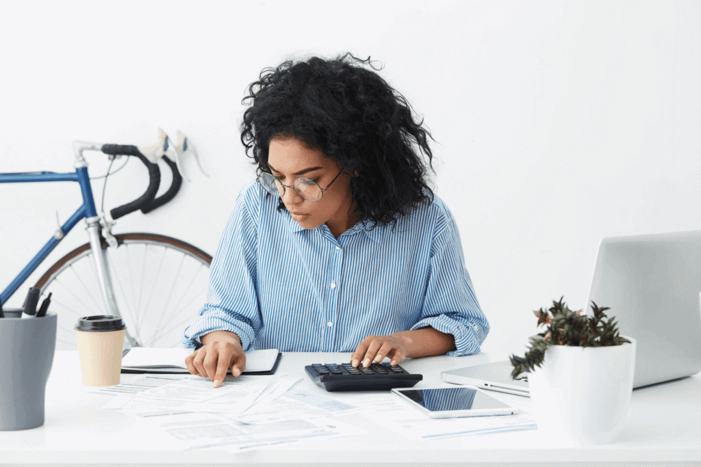 Woman-working-on-a-calculator
