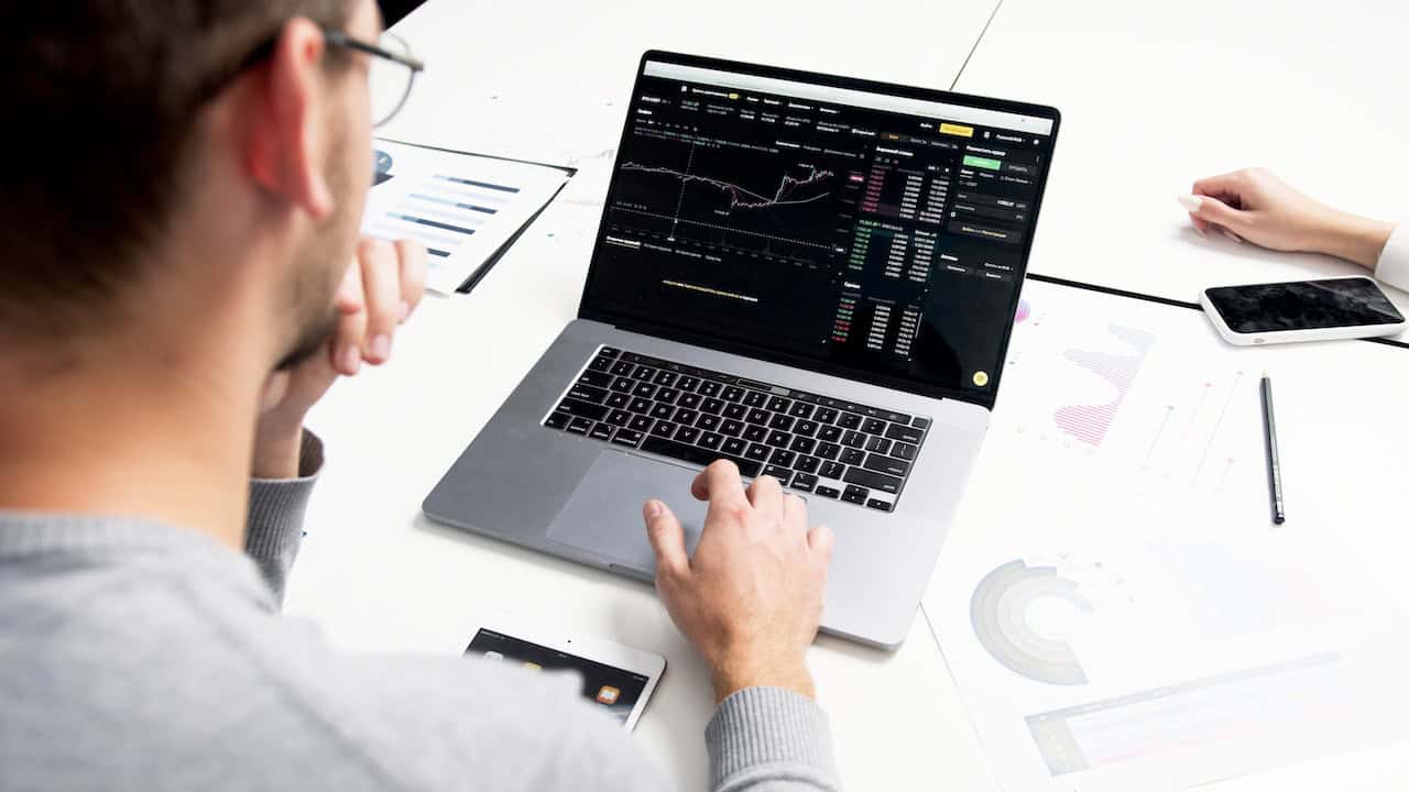 image of a man working on a computer