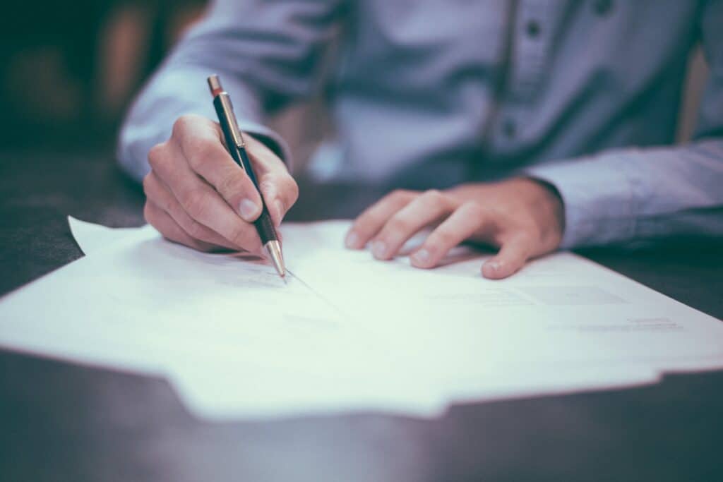 image of a man writing