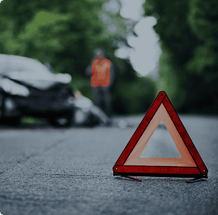 image of a stationary vehicle hazard triangle