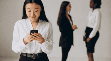 three-multicultural-business-women-working-together
